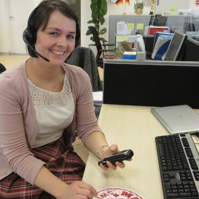 Member of the Accu-Chek patient helpline talking to a caller