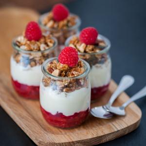 Yoghurt with crushed raspberry and granola
