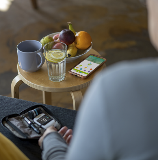 Man using mySugr app
