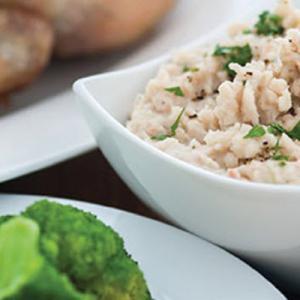 Roast chicken with white bean mash in a bowl