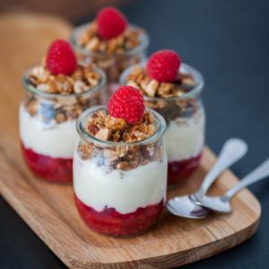 Yoghurt with crushed raspberry and granola
